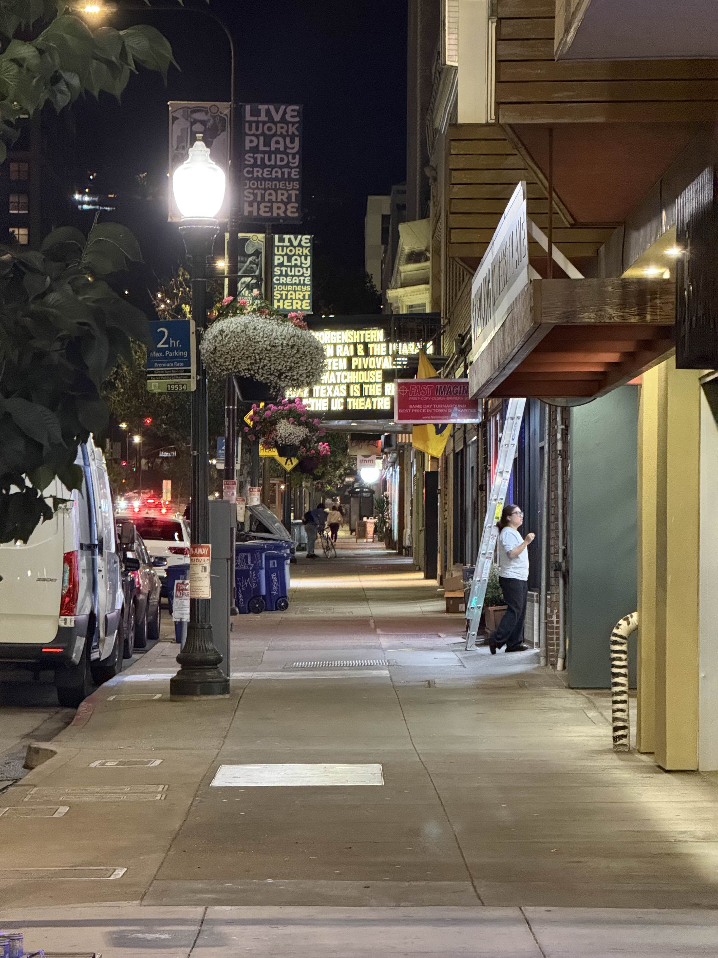Telephoto framing of a street from far away.